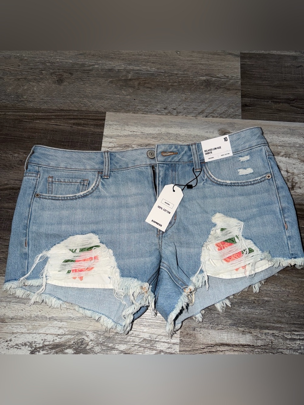 Express Light Blue Denim Shorts with floral Embroidered Rips size 10